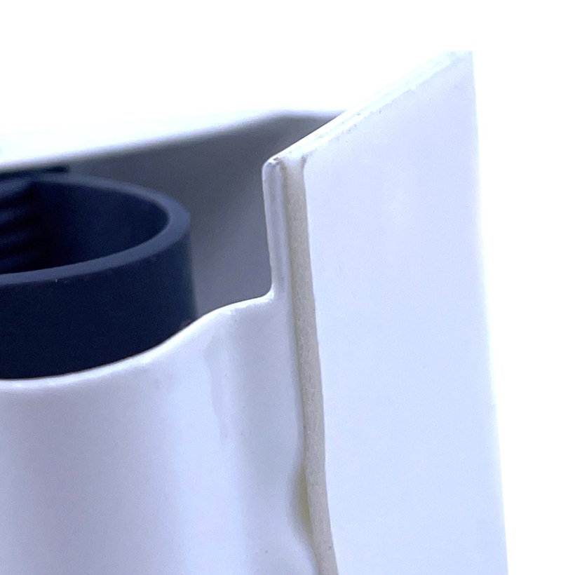 Držák na metlu nalepovací 34x52x42mm